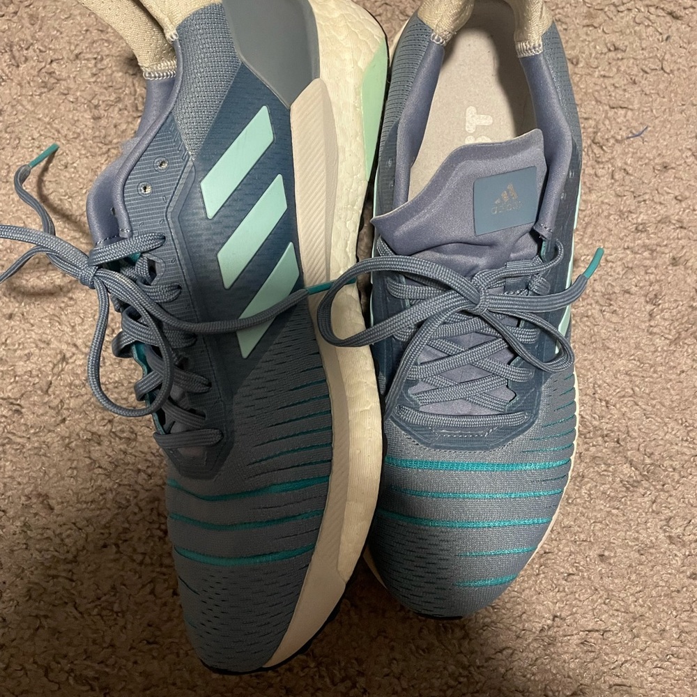 Woman’s Adidas tennis shoes